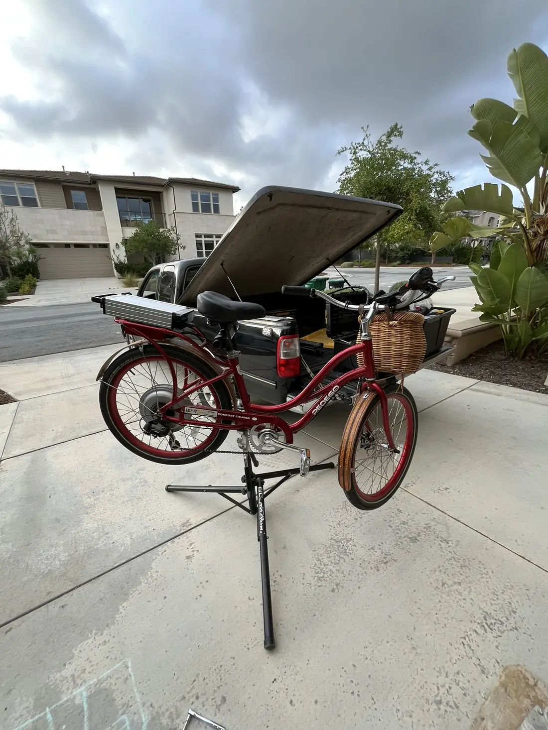 Adult trike tune-up in driveway