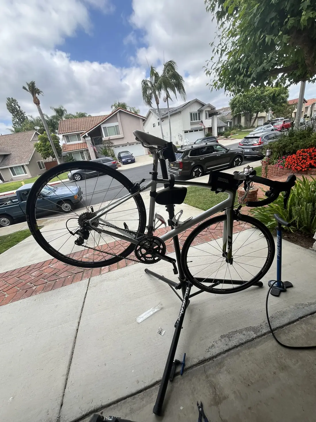 Red bike on repair stand indoors