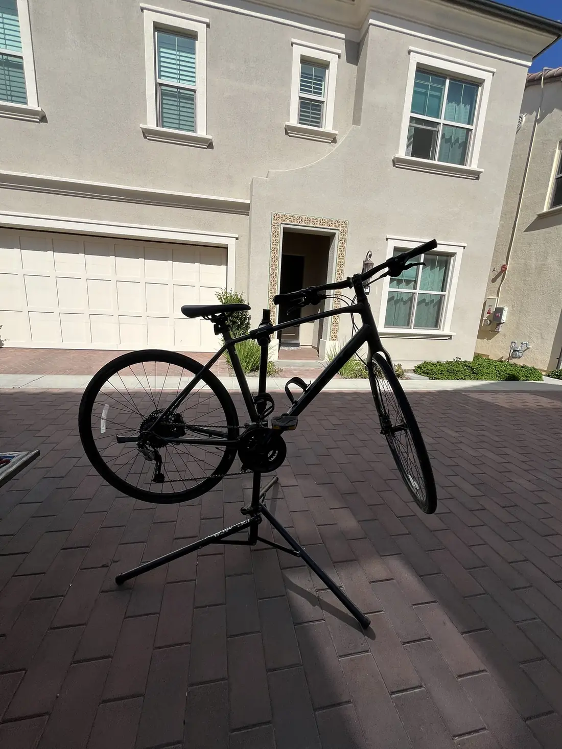 E-bike service on paver driveway